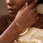 ANVIRA Gold Bow Charm Bracelet — view 3