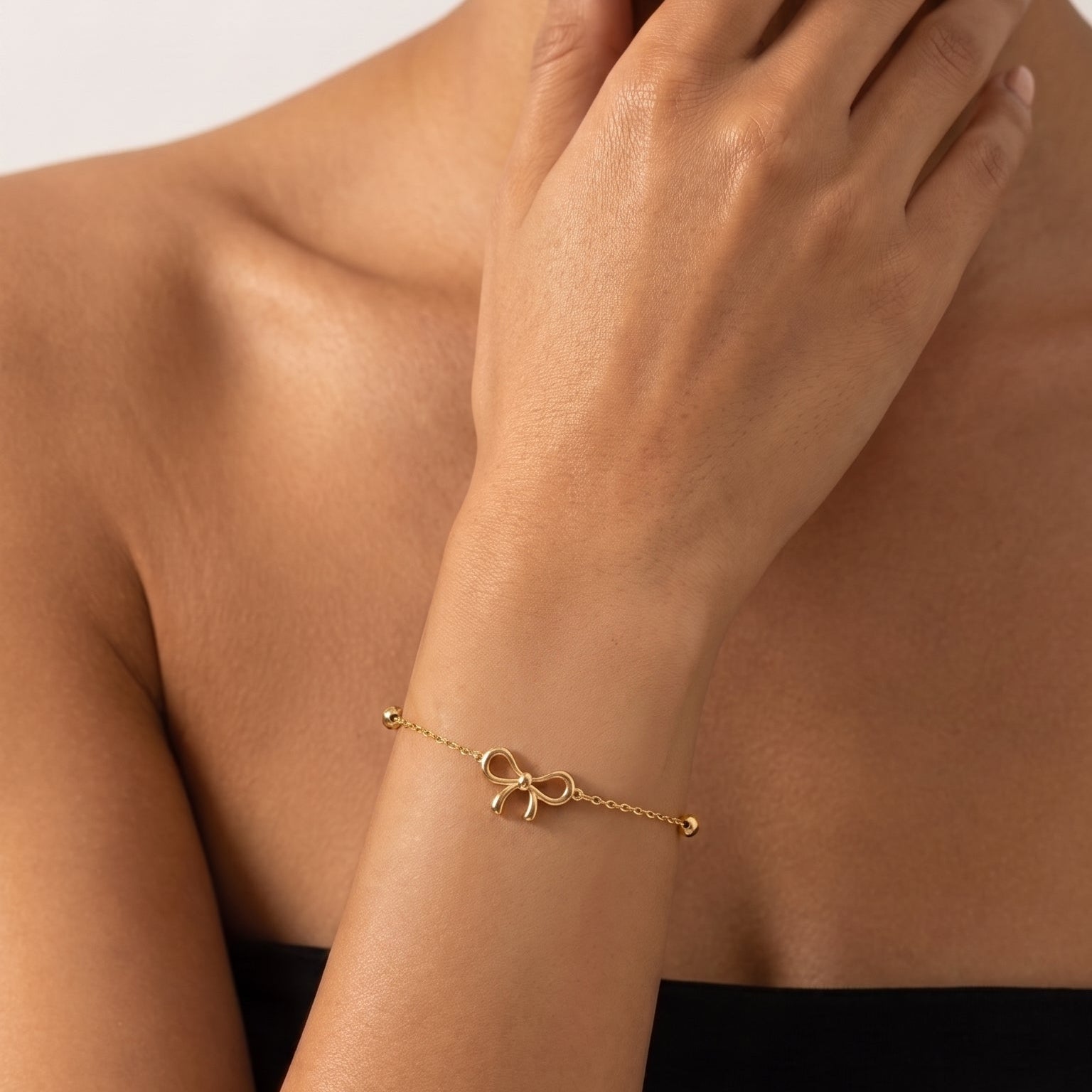 ANVIRA Gold Bow Charm Bracelet — view 4