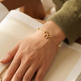 ANVIRA Gold Bow Charm Bracelet — view 8