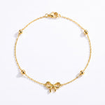 ANVIRA Gold Bow Charm Bracelet in 18K gold plated 925 sterling silver