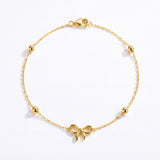 ANVIRA Gold Bow Charm Bracelet in 18K gold plated 925 sterling silver