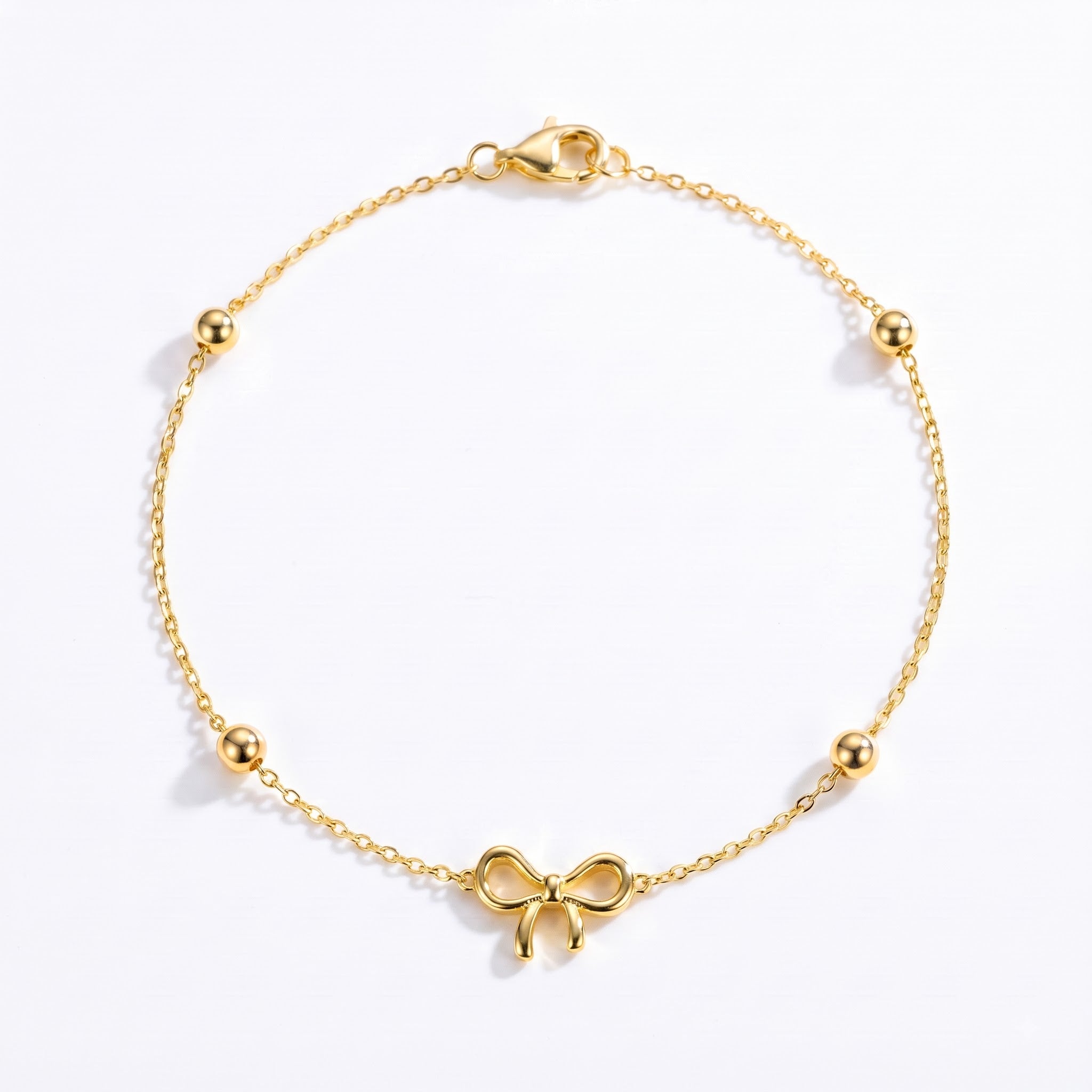 ANVIRA Gold Bow Charm Bracelet in 18K gold plated 925 sterling silver