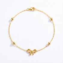 ANVIRA Gold Bow Charm Bracelet in 18K gold plated 925 sterling silver